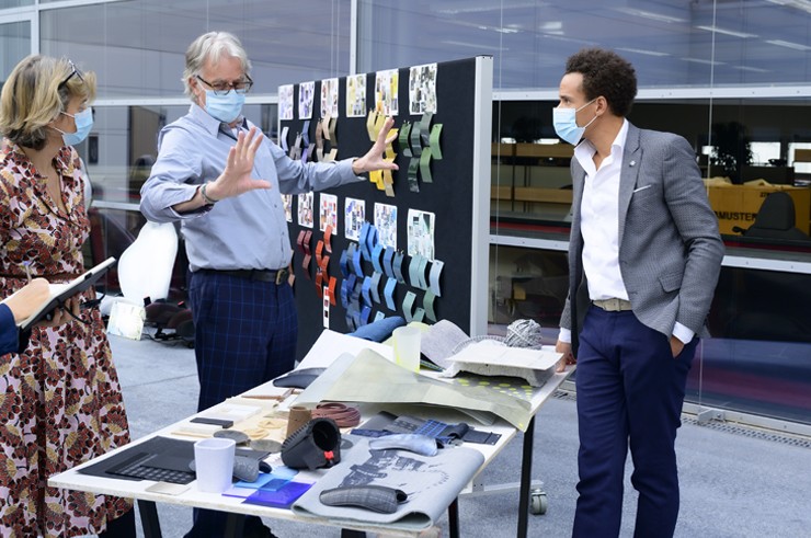 Paul Smith with his team Paul Smith with his team